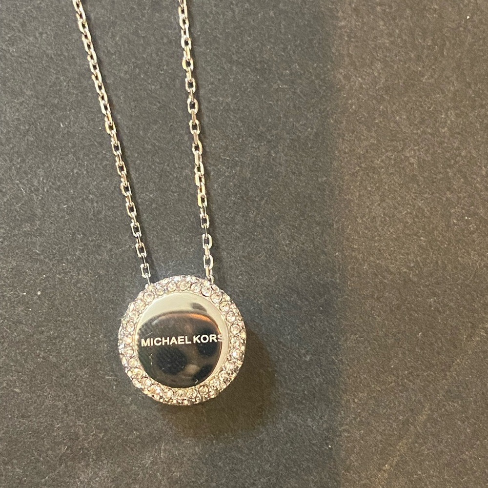 Michael KORS 
16"-18" adiustable Necklace Pendant
NWT $100MA